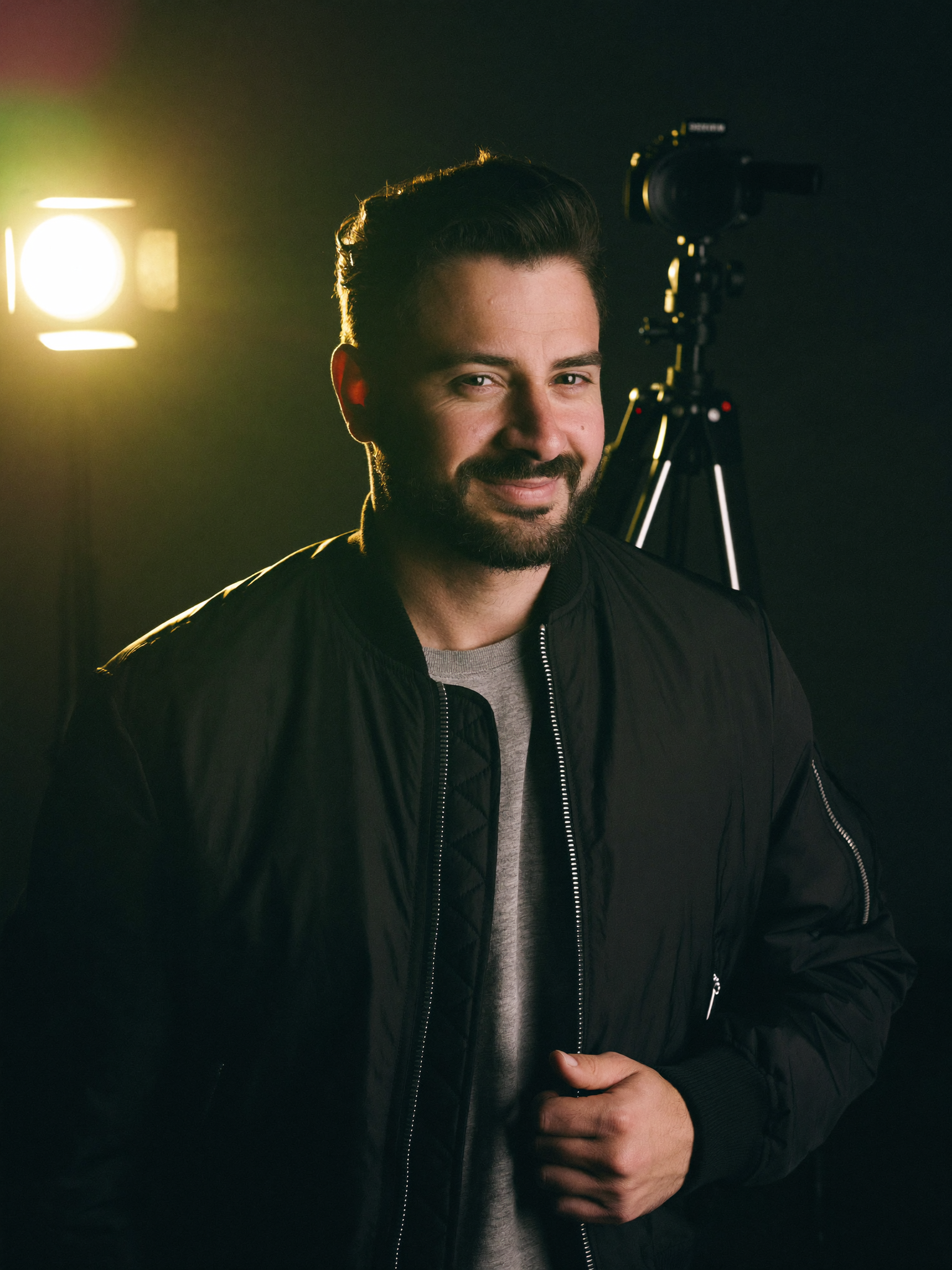 Operator portrait — creator in studio with camera + softbox
